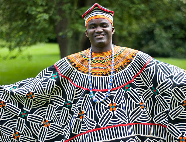 A man in a traditional patterned robe